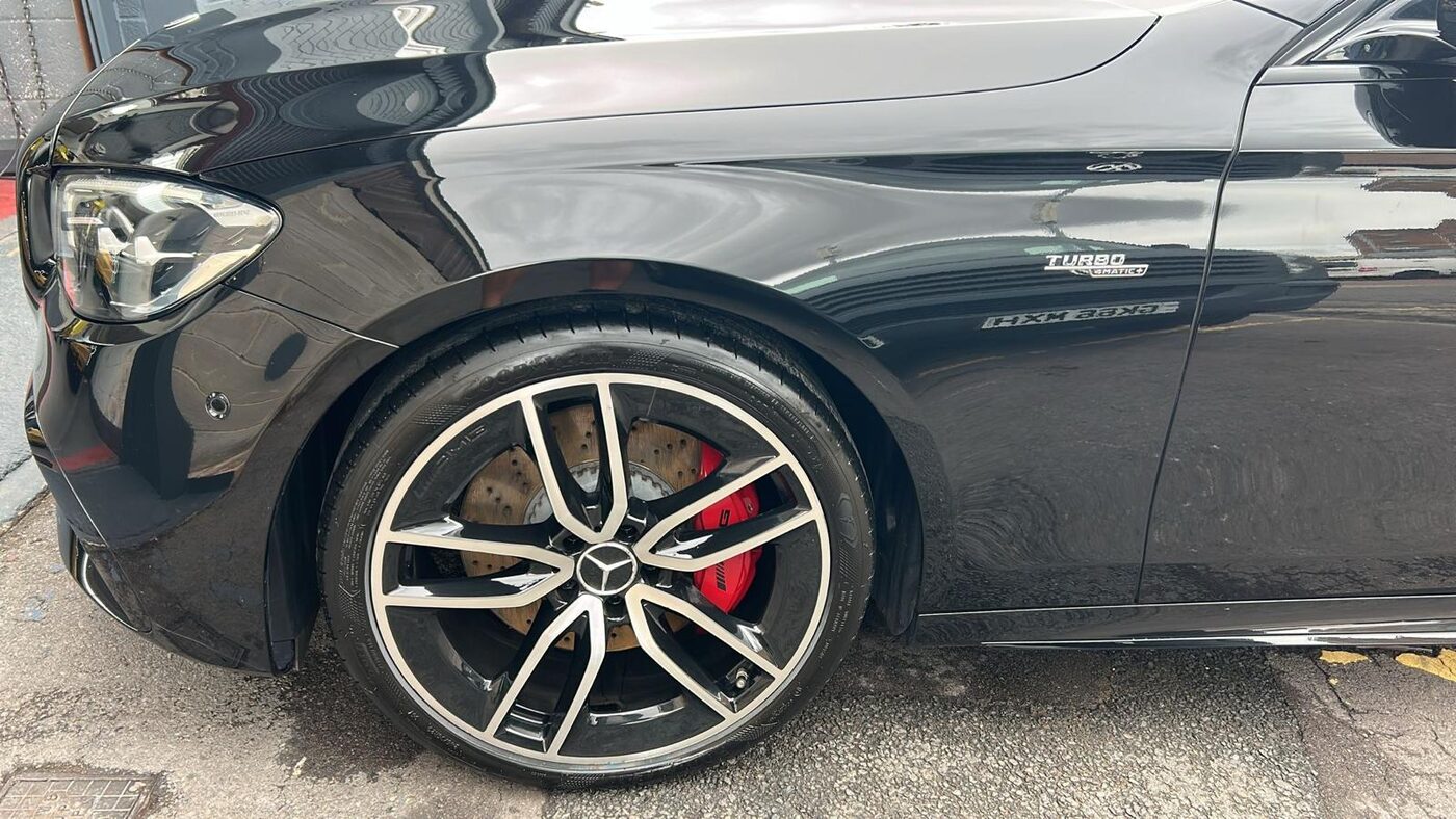Close-up of PPF fitting on Mercedes-AMG E53 wheel arch
